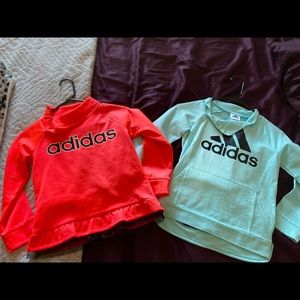 Two Adidas outfits